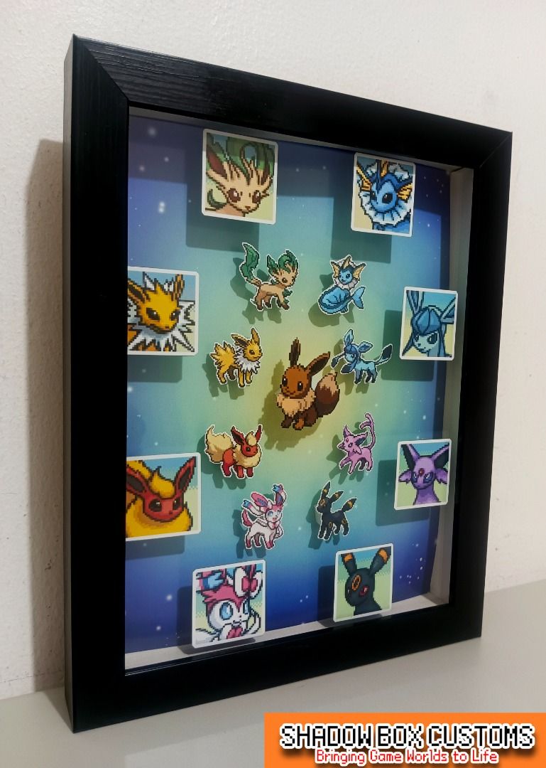 Pokemon Eeveelutions Video Game Shadow Box (Category: Nintendo) located in Quezon City. Submitted by natzuki10 (Listing ID 1466363962, Image 3). Description: Pokemon Eeveelutions Video Game Shadow Box Height: 10 inches Width: 8 inches 750 w/o lights 920 w/ lights *Handmade Pixel Shadow Boxes *Accepting Customized Designs *Perfect for Gamers & Collectors #videogames #nintendo #roomdecor #collection #gamer #gift.