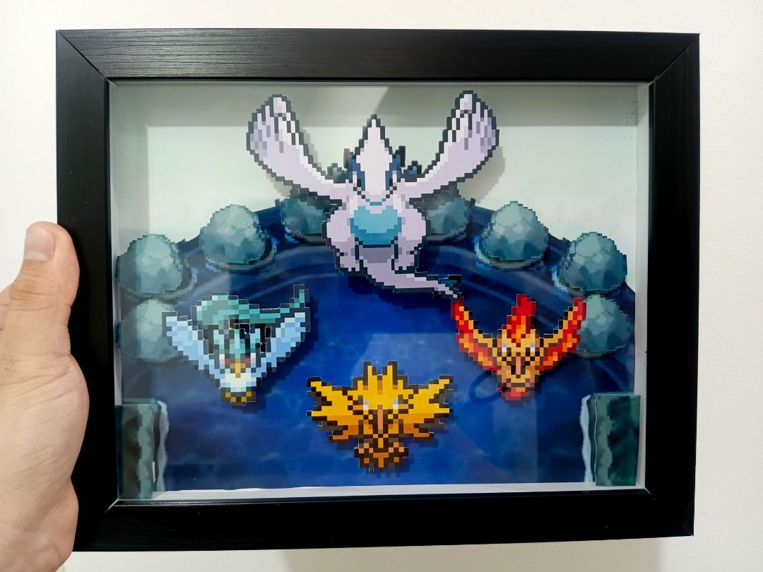 Pokemon Legendary Birds Video Game Shadow Box (Category: Nintendo) located in Quezon City. Submitted by natzuki10 (Listing ID 1466361464, Image 1). Description: Pokemon Legendary Birds Video Game Shadow Box Height: 8 inches Width: 10 inches 750 w/o lights 920 w/ lights *Handmade Pixel Shadow Boxes *Accepting Customized Designs *Perfect for Gamers & Collectors #videogames #nintendo #roomdecor #collection #gamer #gift .
