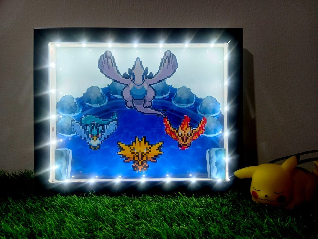Pokemon Legendary Birds Video Game Shadow Box (Category: Nintendo) located in Quezon City. Submitted by natzuki10 (Listing ID 1466361464, Image 2). Description: Pokemon Legendary Birds Video Game Shadow Box Height: 8 inches Width: 10 inches 750 w/o lights 920 w/ lights *Handmade Pixel Shadow Boxes *Accepting Customized Designs *Perfect for Gamers & Collectors #videogames #nintendo #roomdecor #collection #gamer #gift .