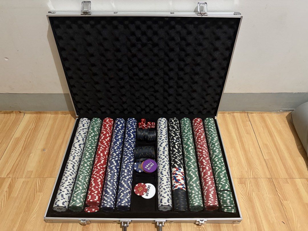 Poker chip set in aluminum carrying case (Category: Board Games & Puzzles) located in Subic. Submitted by ruhzzel (Listing ID 1466525634, Image 1). Description: -Poker chip set in a sturdy silver aluminum carrying case - Includes multicolored clay-composite poker chips, red dice, dealer button, and small blind button - Foam-lined interior keeps items secure and organized during transport - Perfect and ready for game nights at home.