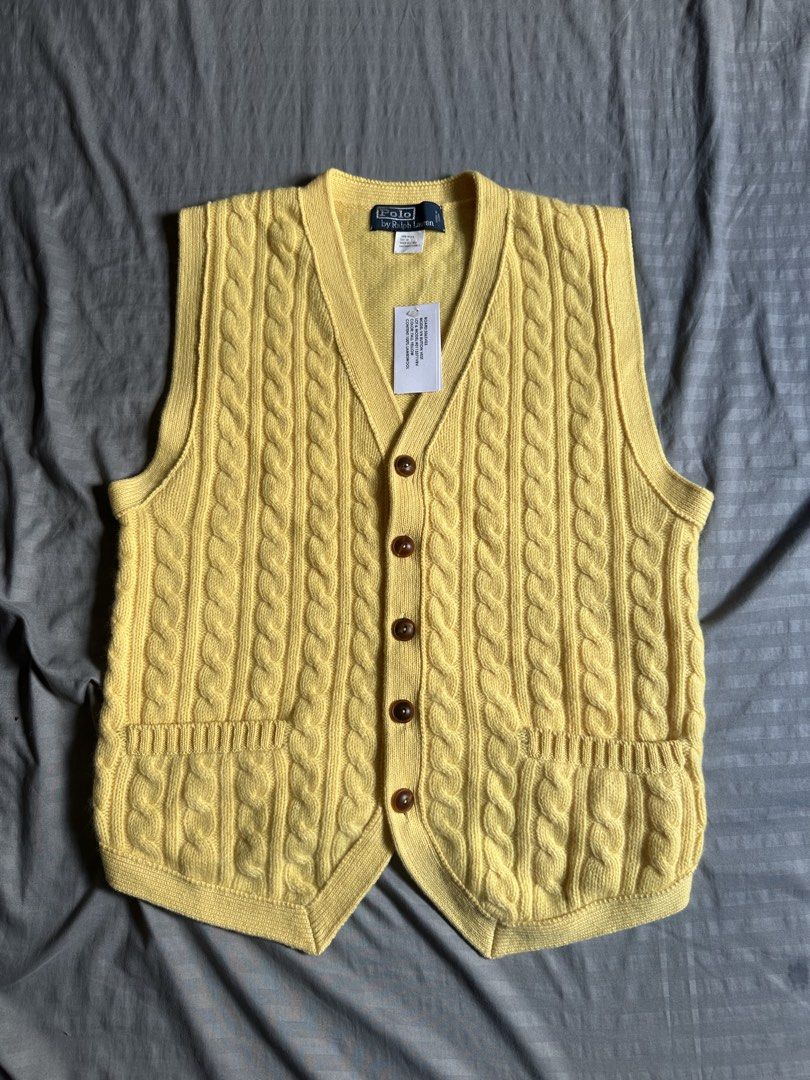 Polo by Ralph Lauren Fall Yellow Wool Cable Button Vest (Category: Sleeveless) located in Quezon City. Submitted by stre3tw3ar (Listing ID 1466381887, Image 1). Description: - Brand: Polo by Ralph Lauren - Style: Cable knit button vest with V-neck and dual lower front pockets - Color: Fall Yellow - Material: 100% Lambswool - Size: Men's Medium - Condition: Brand new with tags attached (December 2009 salesman sample piece) - Perfect layering piece