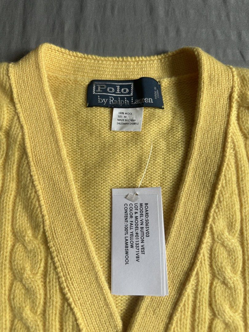 Polo by Ralph Lauren Fall Yellow Wool Cable Button Vest (Category: Sleeveless) located in Quezon City. Submitted by stre3tw3ar (Listing ID 1466381887, Image 2). Description: - Brand: Polo by Ralph Lauren - Style: Cable knit button vest with V-neck and dual lower front pockets - Color: Fall Yellow - Material: 100% Lambswool - Size: Men's Medium - Condition: Brand new with tags attached (December 2009 salesman sample piece) - Perfect layering piece
