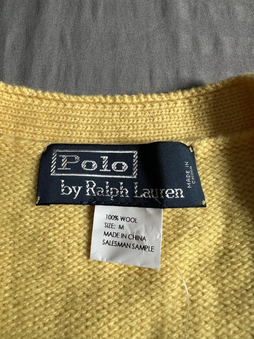 Polo by Ralph Lauren Fall Yellow Wool Cable Button Vest (Category: Sleeveless) located in Quezon City. Submitted by stre3tw3ar (Listing ID 1466381887, Image 3). Description: - Brand: Polo by Ralph Lauren - Style: Cable knit button vest with V-neck and dual lower front pockets - Color: Fall Yellow - Material: 100% Lambswool - Size: Men's Medium - Condition: Brand new with tags attached (December 2009 salesman sample piece) - Perfect layering piece