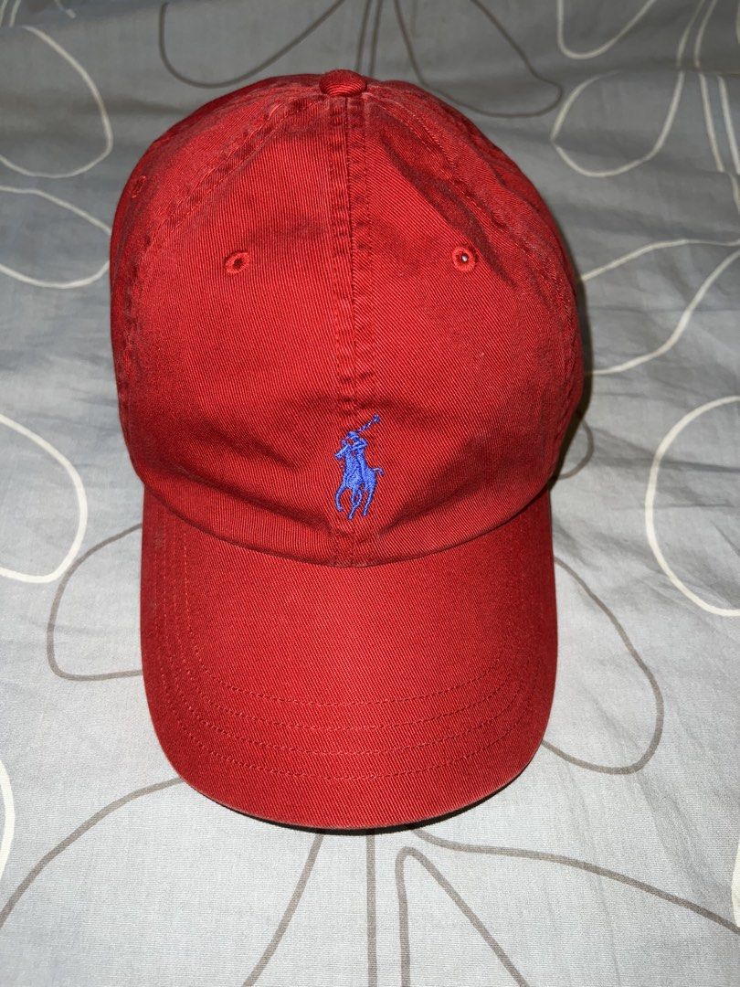 Polo Ralph Lauren Red Cap (Category: Caps & Hats) located in Makati City. Submitted by arbbote (Listing ID 1466368164, Image 1). Description: - Still in good condition - Blue logo - Leather strap - One size fits all Message for more photos MOP: GCash/GoTyme .