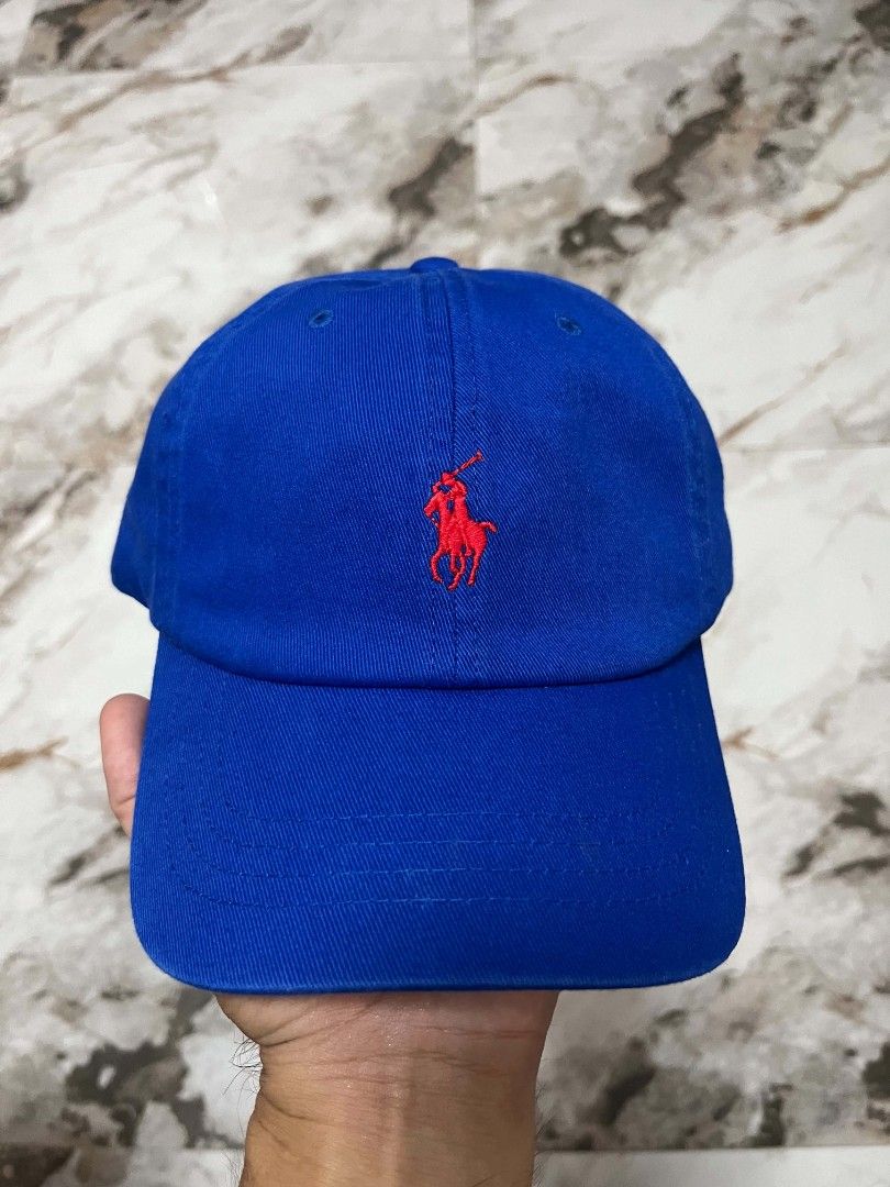 Polo Ralph Lauren Royal Blue Dad Hat (Category: Caps & Hats) located in Guagua. Submitted by copthacap_ (Listing ID 1466419230, Image 1). Description: condition: brand new issue: none color may vary due to lighting mop: gcash shipping: J&T loc: guagua, pampanga (open for meet ups).