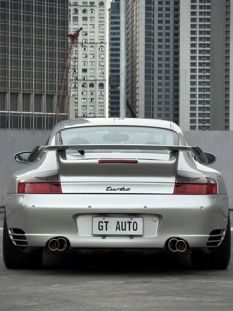 Porsche 911 Turbo 996 Auto (Category: Used Cars) located in Pasig City. Submitted by gtautoph (Listing ID 1466424500, Image 3). Description: ⬛️🟥🟨 FOR SALE 🟨🟥⬛️ 2001 Porsche 911 Turbo 996 TECHART 3.6L Twin-Turbocharged Flat-6 414 HP 560 Nm Torque 5-Speed Tiptronic S Automatic Transmission All-Wheel Drive Porsche Mezger Engine VarioCam Plus Porsche Stability Management (PSM) Arctic Silver Exterior Black Leather Interior 18” TECHART Formula 5-Sp