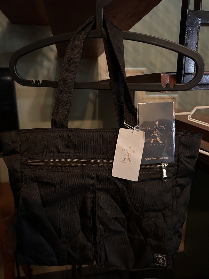Porter International Tote Bag (Category: Luxury Bags & Wallets) located in Quezon City. Submitted by jaypee.abergas (Listing ID 1466485327, Image 2). Description: Porter Int’l Tote Bag Deadstock/ unused No issue With tag & care card 3.5k.