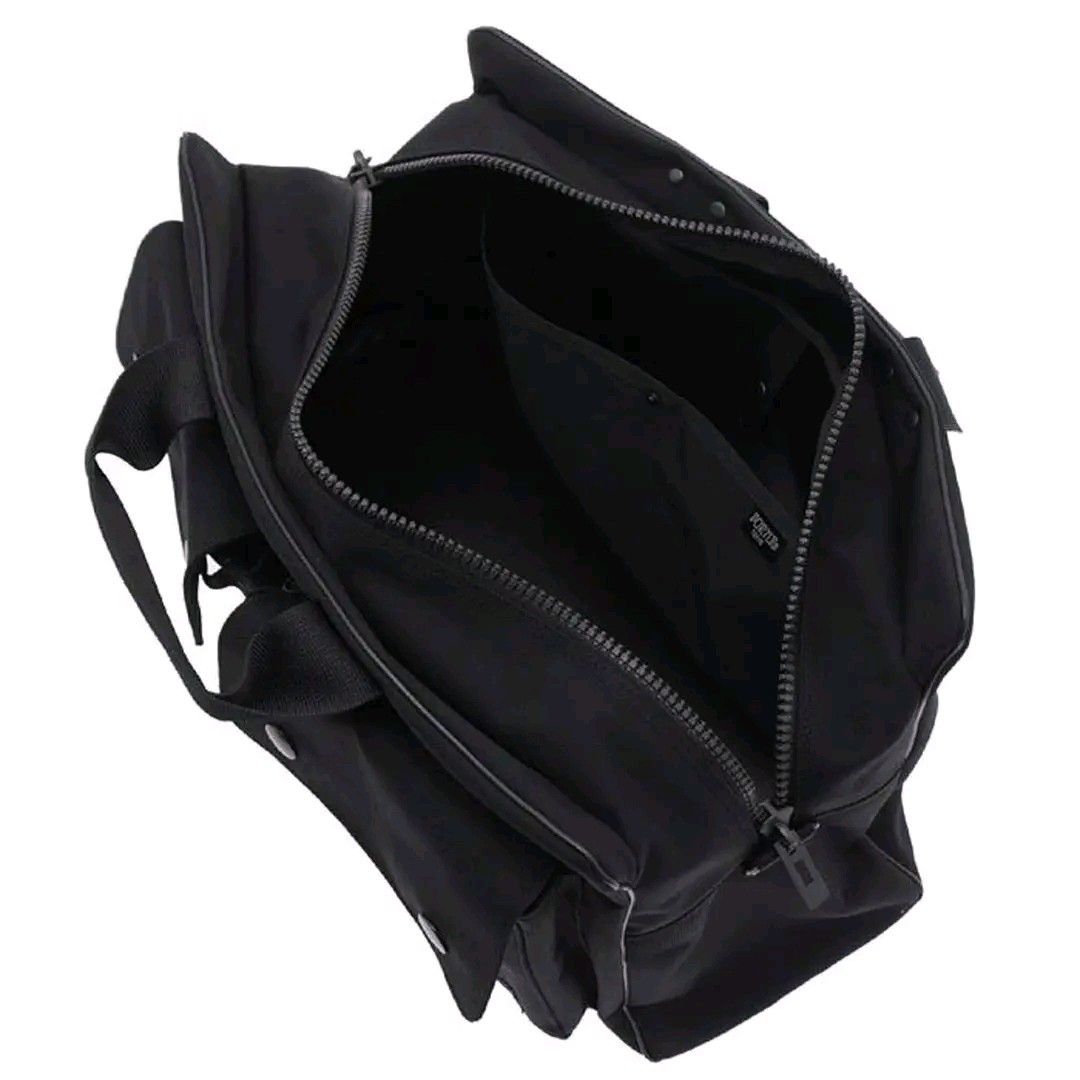 PORTER JAPAN 2WAY ANGLE DUFFLE BAG (Category: Sling Bags) located in Puerto Princesa. Submitted by wintergarmentshop (Listing ID 1466409961, Image 2). Description: PORTER JAPAN ANGLE 2 WAY DUFFLE BAG EXCELLENT MINIMAL DENTS NO MAJOR ISSUES 9.5/10 Key Features • Brand/Maker: Yoshida & Co. / Porter (Japan) • Design/Style: 2-way utility bag / duffle / business brief with dual snap-flap front pockets and top grab handle with leather/snap wrap • Mater