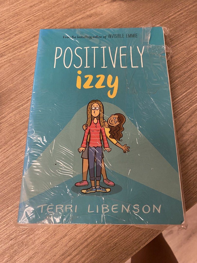 Positively Izzy Terri Libenson Novel (Category: Storybooks) located in Santa Rosa. Submitted by hoardqueensdeclutter (Listing ID 1466417926, Image 1). Description: - Title: Positively Izzy by Terri Libenson - Format: Paperback edition - Target Age: 8 to 12 years old - Condition: Brand new, still wrapped in original plastic protective covering - Note: Original Fully Booked price sticker attached to the back cover - Perfect for fans of relatable mi