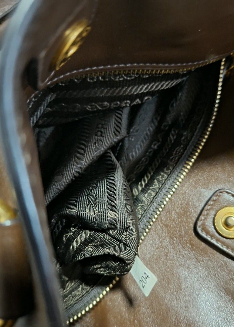 Prada (Category: Shoulder Bags) located in Manila. Submitted by givesudlyt08 (Listing ID 1466468925, Image 3). Description: authentic prada , almost new , no issue ,price neg..
