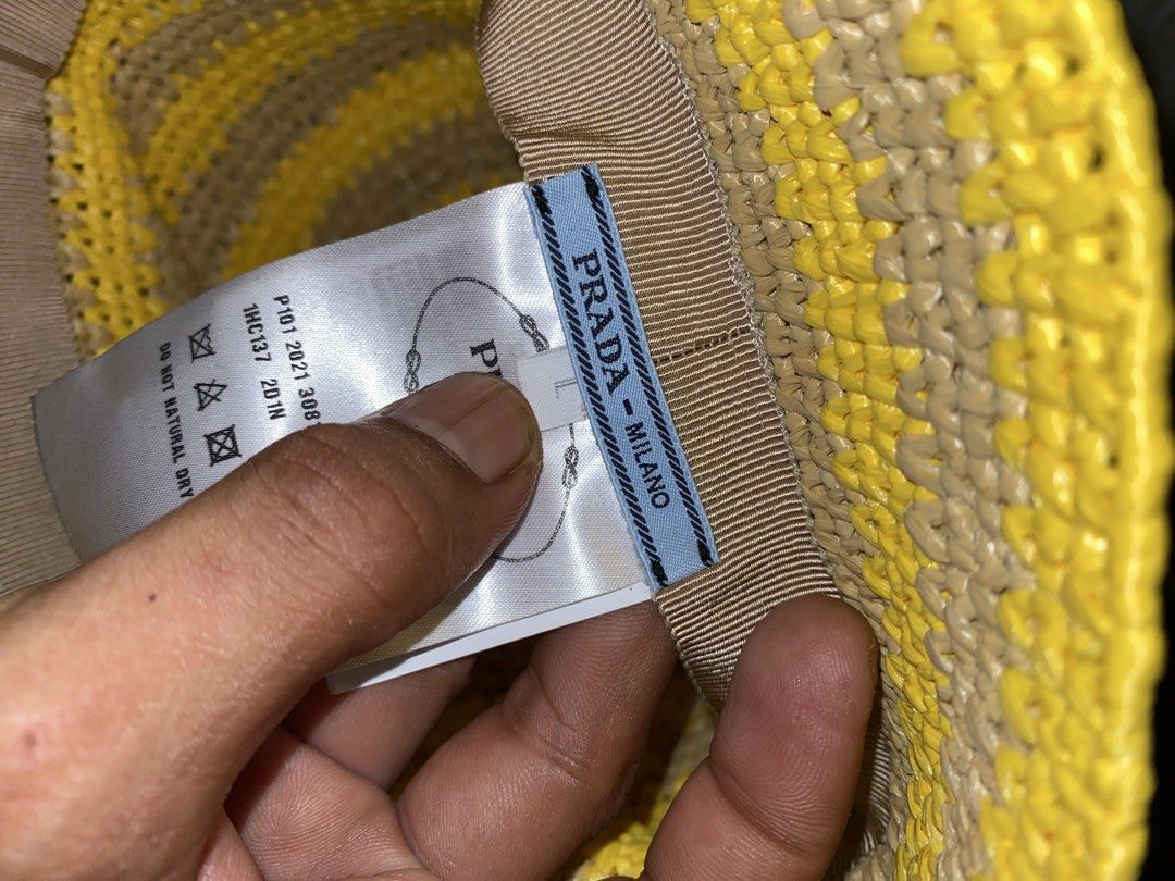 PRADA (Category: Luxury Apparel) located in Lantawan. Submitted by alfhadzrie23687 (Listing ID 1466507677, Image 3). Description: Prada raffia stripped logo embroidered womens bucket hat .