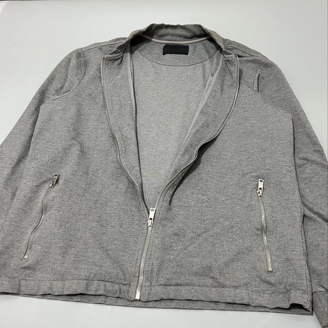 Prada - Bomber Jacket - Zip Up (Category: Coats, Jackets and Outerwear) located in Cavite. Submitted by asianluxe (Listing ID 1466441758, Image 3). Description: PRADA - Bomber Jacket - Zip Up Flat measurements! Size:XL Length:28 inches Armpit to armpit:24 inches Sleeve:25 inches Shoulder to shoulder:19 inches Good condition Very presentable No flaw or damage.