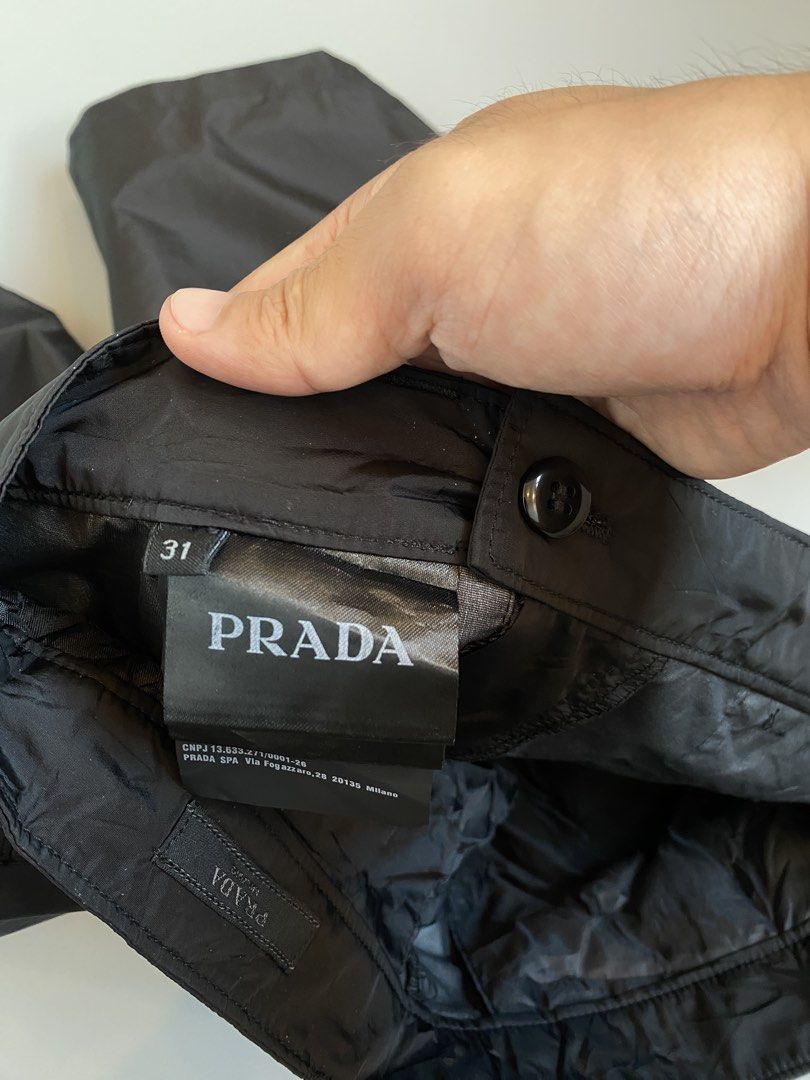 Prada Black Nylon Shorts (Category: Shorts) located in Cavite. Submitted by awuuu27 (Listing ID 1466372020, Image 3). Description: PR@DA Nylon Shorts 💎 DIMES: Width-29/Length-21.5/Leg Opening-10.5/Thigh-12 CONDITION: 9.8/10 (asnew condition) COLOR RATE: 9.5/10 ISSUE: none .