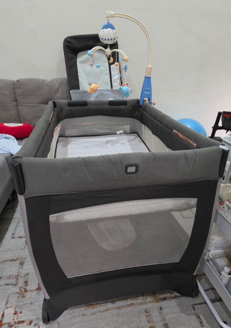 Preloved Chicco 4in1 Playard + Bassinet (Category: Cots & Cribs) located in Manila. Submitted by silverflower_69c7c9 (Listing ID 1466445199, Image 1). Description: Preloved Chicco 4in1 - Bassinet (infant) - Raised sleeping lounger (infant) - Playard (toddlers) - Changing Table Like new condition. RFS: hindi na nagagamit.