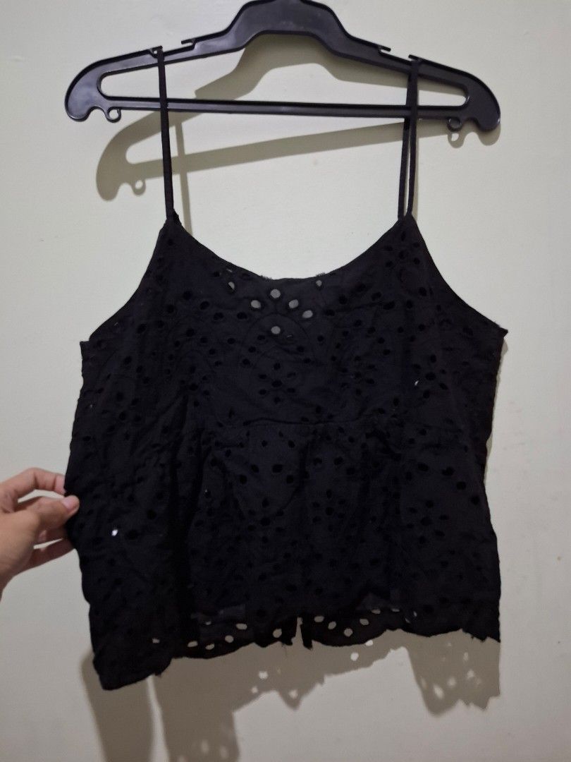 Primark Black Eyelet Lace Tank Top (Category: Sleeveless) located in Tuguegarao City. Submitted by potaetonim (Listing ID 1466479316, Image 2). Description: - Brand: Primark - Color: Black with floral embroidery and eyelet cutouts - Style: Sleeveless, scalloped hem, button-back closure with fabric-covered buttons - Material: Lightweight, perfect for warm weather or layering - Size: UK 10 / EUR 38 / US 6.