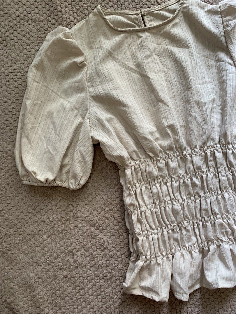 Puff Beige Top Blouse (Category: Blouses) located in Manila. Submitted by nuelaar (Listing ID 1466426550, Image 2). Description: RFS: Wrongs size.