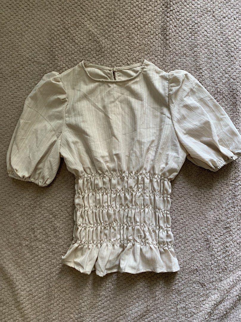 Puff Beige Top Blouse (Category: Blouses) located in Manila. Submitted by nuelaar (Listing ID 1466426550, Image 1). Description: RFS: Wrongs size.