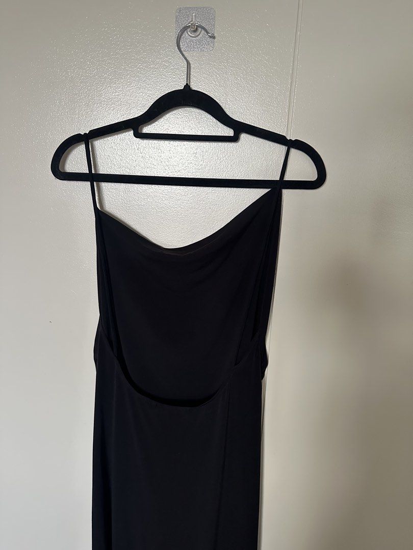 Pull & Bear Black Cowl Neck Midi Dress (Category: Dresses) located in Mandaluyong City. Submitted by youarecutejeans (Listing ID 1466439516, Image 2). Description: - Brand: Pull & Bear - Style: Black midi slip dress - Size: Medium (fits true to size) - Details: Cowl neckline, thin spaghetti straps, ruched sides, and open back - Perfect for: Night outs, parties, and dates.
