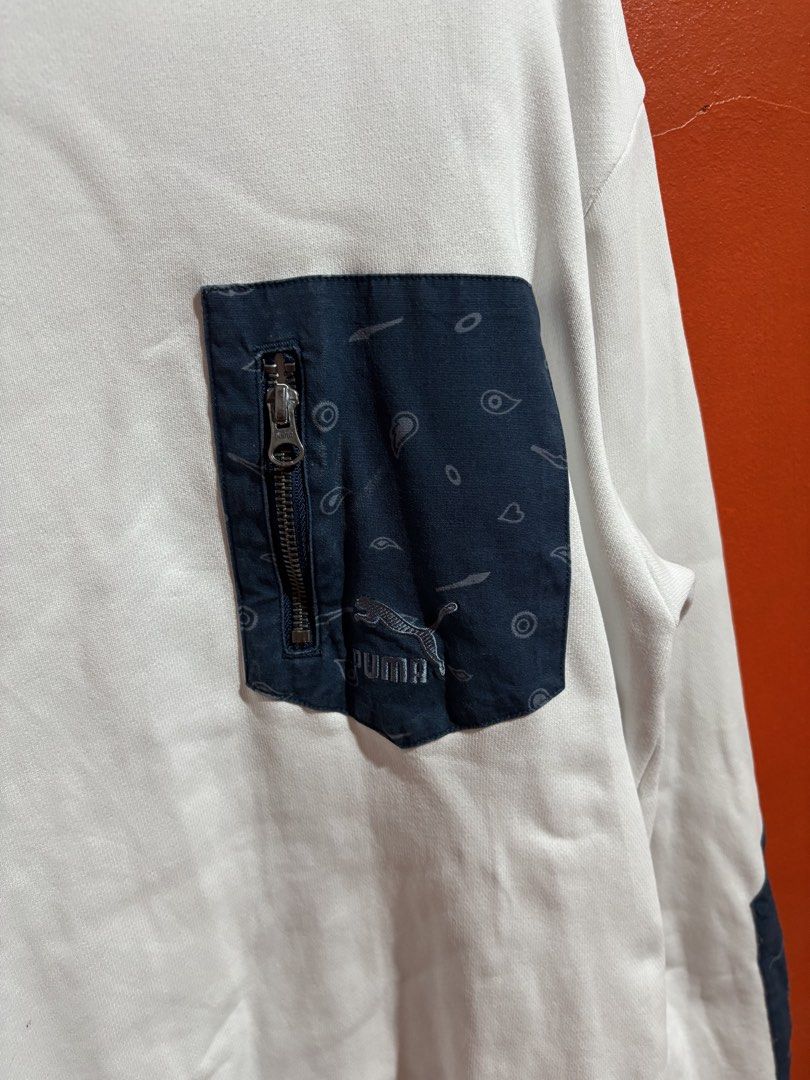 Puma White and Navy Sweatshirt Size XL (Category: Coats, Jackets and Outerwear) located in Naga. Submitted by ajrc.shop (Listing ID 1466475322, Image 3). Description: Puma Bandana Crewneck Zipper Pocket ✅Size: XL ✅Width: 22 ✅Length: 28 ✅Color Rate: 9.8/10 ✅Issue: None ✅Need Wash ✅Location: Bicol Naga City, Camarines Sur ✅Courier: J&T Express/Flash Express ✅MOP: Gcash only.