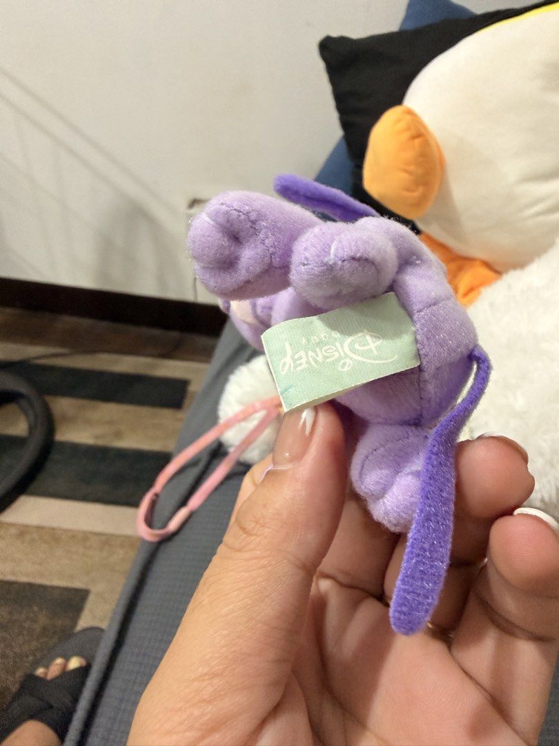 Purple Pluto plush keychain charm from the Disney (Category: Charms) located in Quezon City. Submitted by cookiecreammm (Listing ID 1466548273, Image 3). Description: .