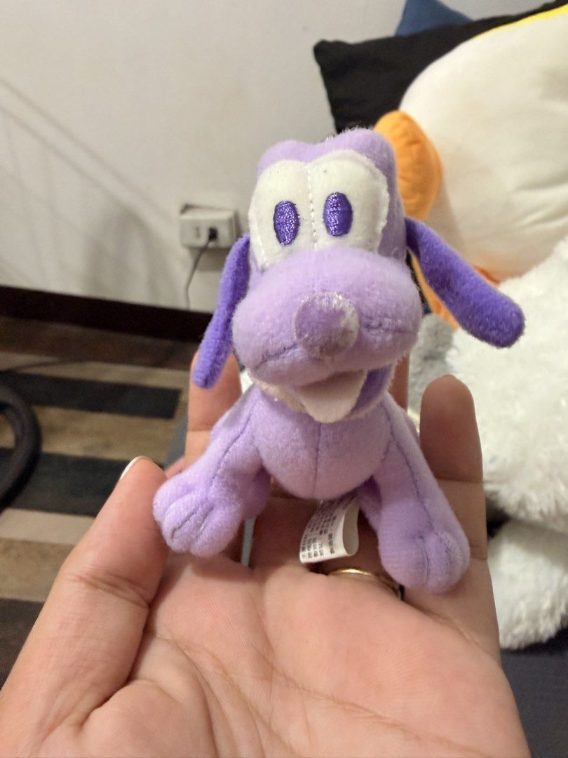 Purple Pluto plush keychain charm from the Disney (Category: Charms) located in Quezon City. Submitted by cookiecreammm (Listing ID 1466548273, Image 1). Description: .