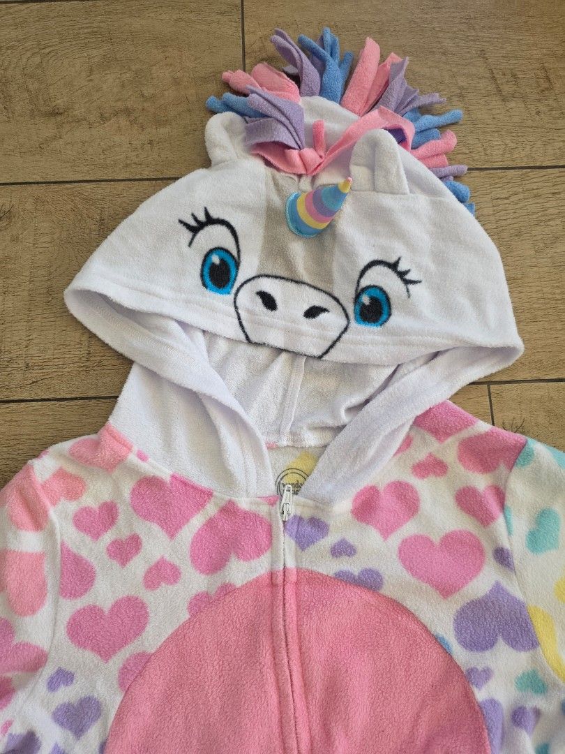 Rainbow Unicorn Onesie (Category: Babies & Kids Fashion) located in Quezon City. Submitted by preloved_by_mariekondo (Listing ID 1466451364, Image 2). Description: Wonder Nation Rainbow Unicorn Onesie, can be used as a costume or pajamas. Front zipper enclosure. Size 6-6x, fits 6yo. Wrong size on the tag..