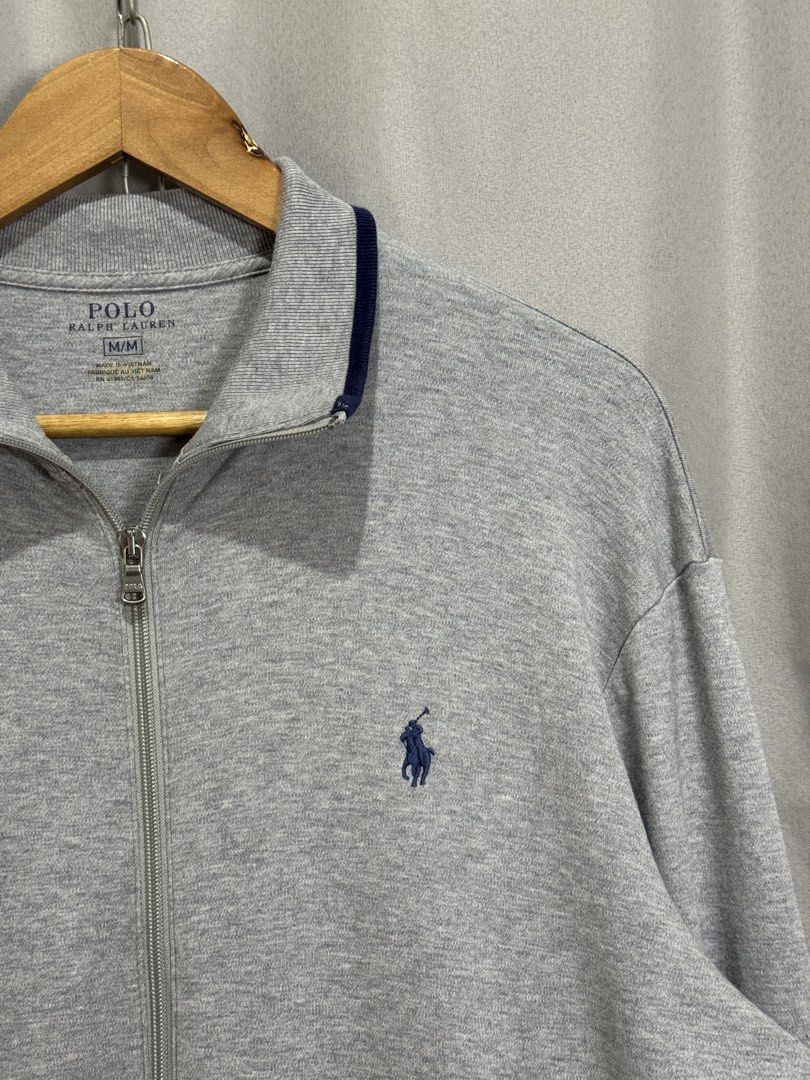 Ralph Lauren Gray Track Jacket (Category: Coats, Jackets and Outerwear) located in Meycauayan. Submitted by itstimothrifts (Listing ID 1466386571, Image 2). Description: Ralph Lauren Gray Track Jacket Excellent Condition M on tag fits L W 23 L 27.5.