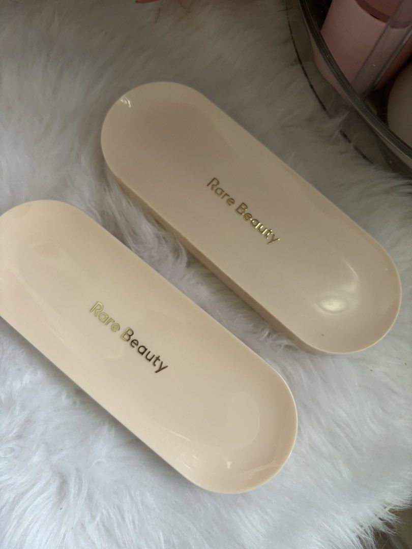 Rare Beauty (Category: Makeup) located in San Pablo. Submitted by closetdeclutter___ (Listing ID 1466370830, Image 3). Description: - LIKE/BNEW - 2 discovery eyeshadow pallet (700 each) - liquid blush in believe shade (BNEW no box 800) - liquid luminizer in mesmerize (no box 800) - 2 highlight powder (no box 700) .