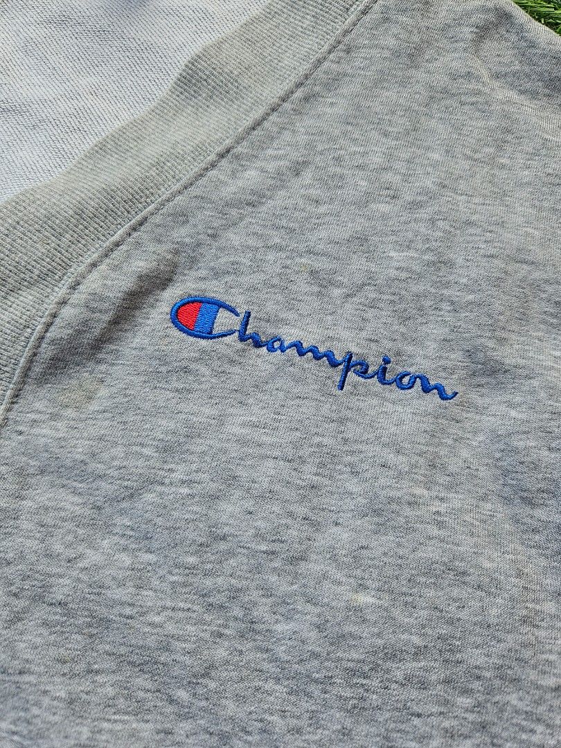 Rare Champion Cardigan (Category: Coats, Jackets and Outerwear) located in Las Pinas. Submitted by rcp123 (Listing ID 1466465598, Image 2). Description: - Brand: Champion - Vintage - Style: Grey button-up cardigan with V-neck - Size: Medium (M) - Unisex - Material: 100% cotton - Details: Embroidered script logo on chest, classic C logo patch on left sleeve, two front pockets - Condition: Excellent, ready to wear - Perfect for layering and casual 