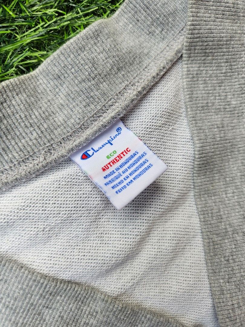 Rare Champion Cardigan (Category: Coats, Jackets and Outerwear) located in Las Pinas. Submitted by rcp123 (Listing ID 1466465598, Image 3). Description: - Brand: Champion - Vintage - Style: Grey button-up cardigan with V-neck - Size: Medium (M) - Unisex - Material: 100% cotton - Details: Embroidered script logo on chest, classic C logo patch on left sleeve, two front pockets - Condition: Excellent, ready to wear - Perfect for layering and casual 