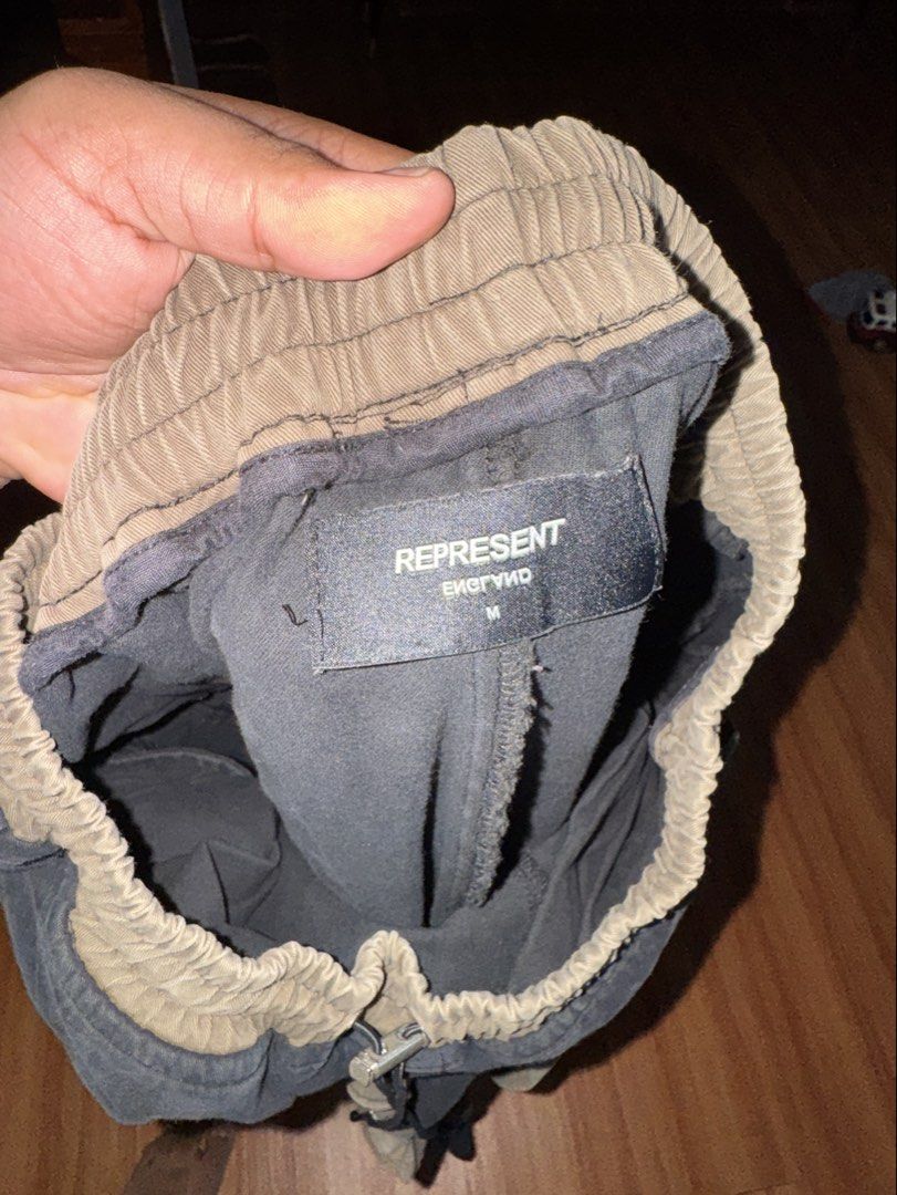 Represent Cargo (Category: Joggers) located in Laoag. Submitted by quin.r (Listing ID 1466408114, Image 2). Description: Medium on tag 1500 shipped Slightly nego.