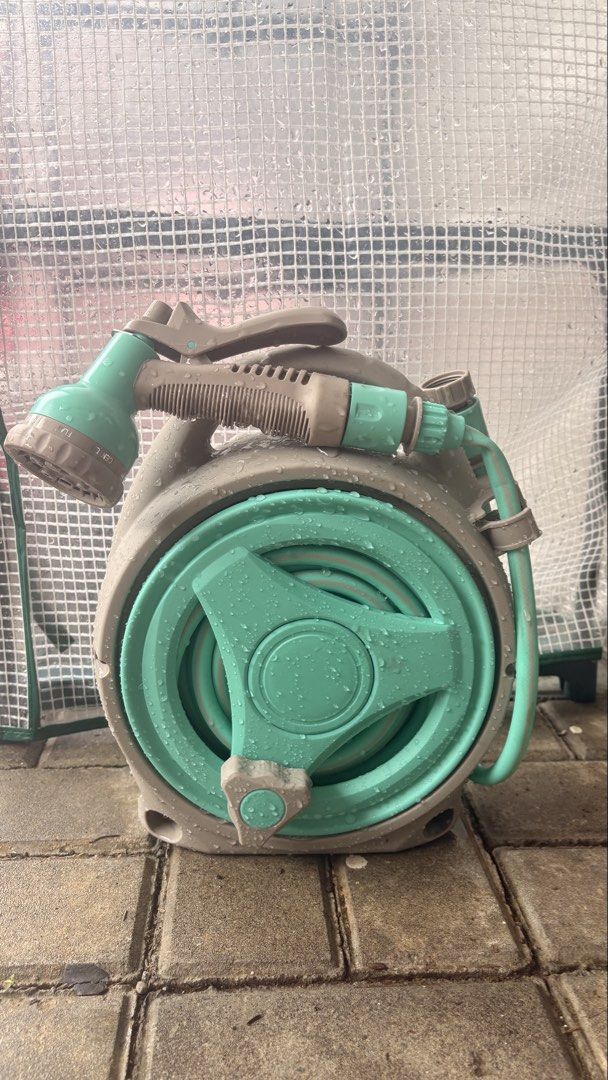 Retractable Garden Hose Reel with Multi-Spray Nozzle (Category: Hose and Watering Devices) located in Quezon City. Submitted by zerowasteMNL (Listing ID 1466396524, Image 1). Description: Retractable water hose for sale 6 Function Sprayer Features a high pressure gun head, adjustable six different shapes nozzle Spray distance: ~10m Water pressure: ~0.2-0.4MBA Length: 15 meter / 20 meter Hose pipe outer diameter: ~11mm Hose pipe inner diameter: ~9