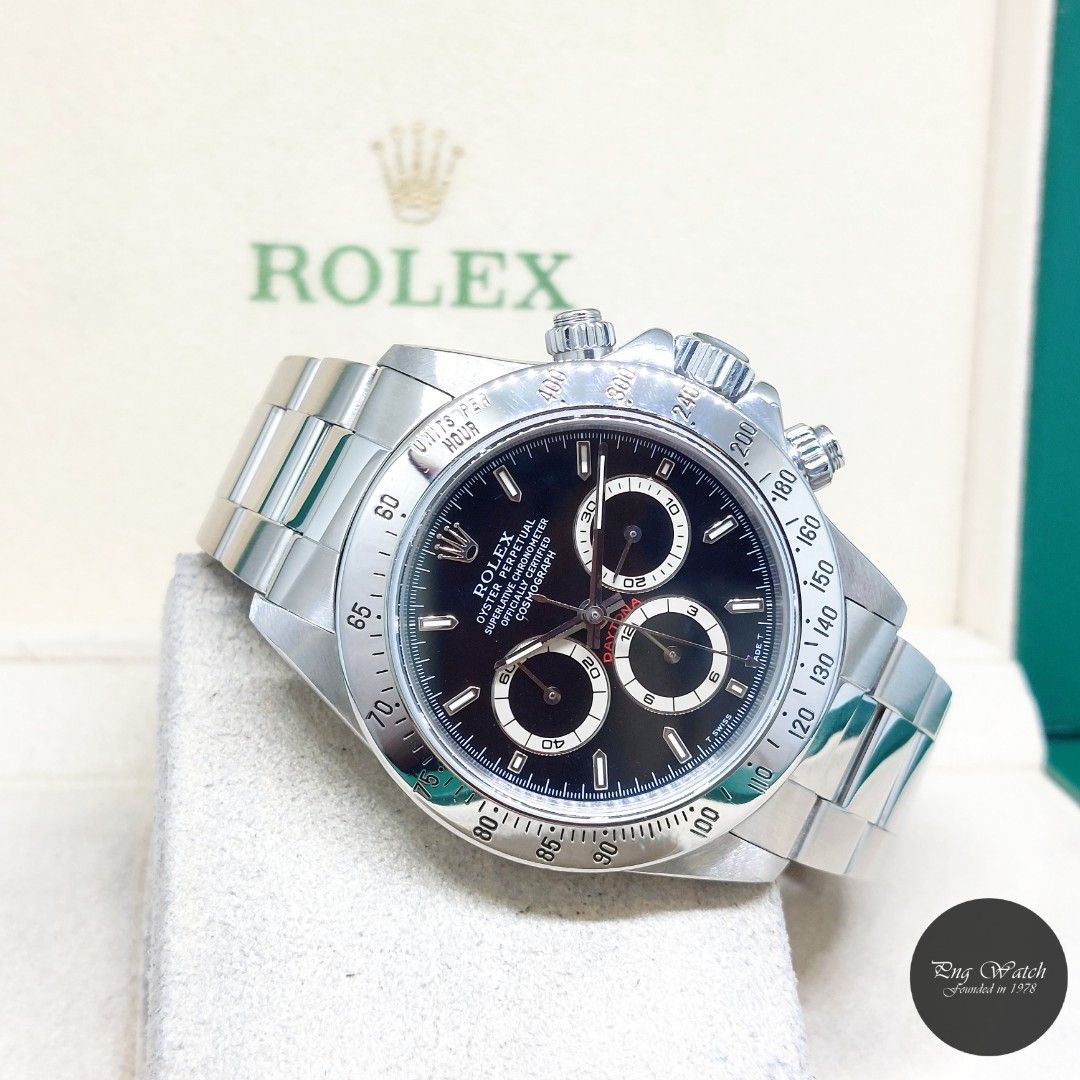 Rolex 40mm Stainless Steel Black Sticks Dial "Zenith Mvt" Daytona REF: 16520 (U Series) (Category: Watches) located in Singapore. Submitted by pngwatchdealer (Listing ID 1466480371, Image 1). Description: [SPECIFICATIONS] **Watch comes with a generic pouch only** Brand: Rolex Model: Oyster Perpetual Daytona (REF: 16520)(U) Movement: Automatic (Self-Winding) Functions and Features: Chronograph, Hours, Minutes and Seconds (CASE) Case Material: Stai