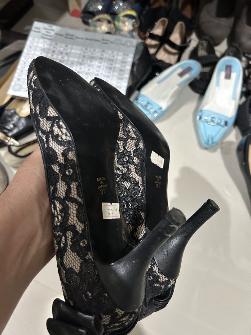 Rubyvivet lace shoes size 37 (Category: Heels) located in Cavite. Submitted by cecitrifthshop (Listing ID 1466461295, Image 3). Description: These are black lace high-heel pumps featuring a prominent black bow accent at the heel/collar.size 37 made in japan .
