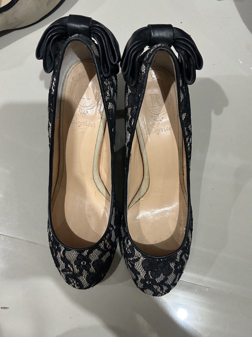 Rubyvivet lace shoes size 37 (Category: Heels) located in Cavite. Submitted by cecitrifthshop (Listing ID 1466461295, Image 1). Description: These are black lace high-heel pumps featuring a prominent black bow accent at the heel/collar.size 37 made in japan .