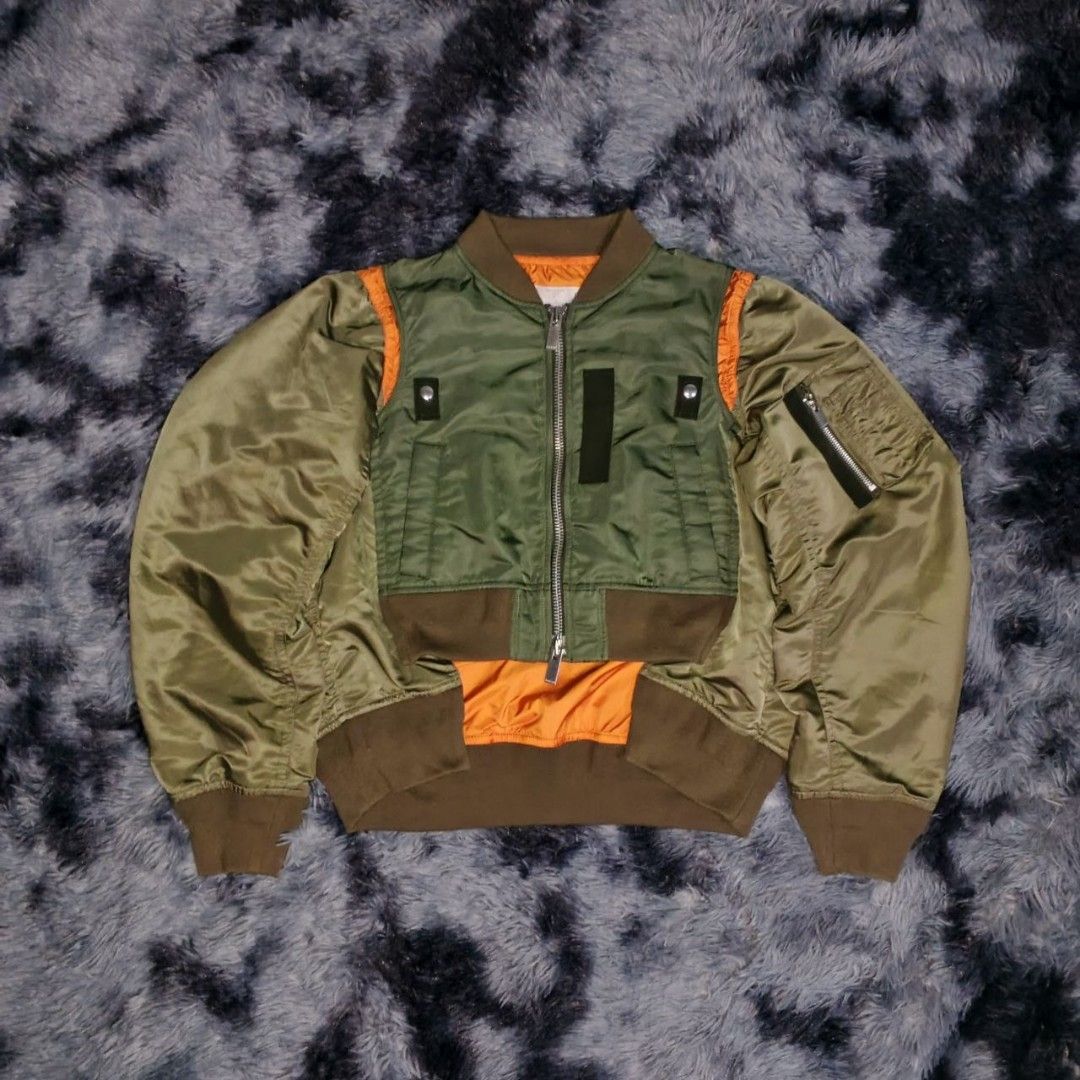 Sacai 20-04846 Fabric Combo MA-1 Blouson Jacket (Customize) (Category: Luxury Apparel) located in Dagupan City. Submitted by finestthriftstuffph (Listing ID 1466462678, Image 2). Description: Check the last pic for removed Part Even this piece is customize, the Looks still Perfect Dm me for When Worn Pic Authentic Very Presentable Size: 4 on Tag Actual Measurement (Measured by INCHES) Width: 24 Length: Front-18 Back-26 Shoulder: 18 Sleeve: 28 Con