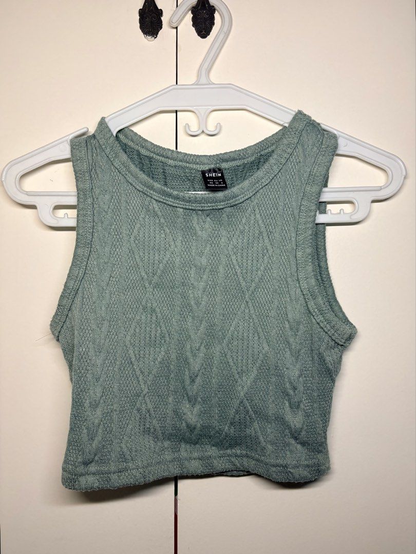 Sage Green Textured Knit Tank Top (Category: Sleeveless) located in Paranaque City. Submitted by honeykkkk (Listing ID 1466482338, Image 1). Description: • Details: Soft sage green color, sleeveless design with a round high crew neckline, textured cable/diamond knit pattern, and a flattering cropped fit. Stretchy and breathable—great for everyday casual, coquette, or summer lookbook outfits. • Condition: Excellent condition — worn a once or twice