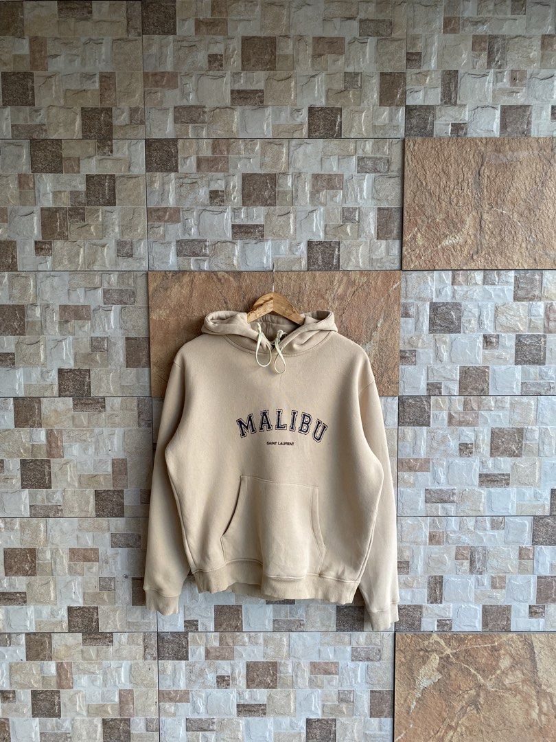 SAINT LAURENT - MALIBU PULL OVER HOODIE (Category: Hoodies) located in Bacolod City. Submitted by timelessbyjosh (Listing ID 1466461994, Image 3). Description: BEST FOR CASUAL & COZY OUTFITS SIZE : MEDIUM ACTUAL COLOR : BEIGE COLOR RATE : 10 OUT OF 10 CONDITION : GOOD MATERIAL : 100 % COTTON MADE IN : ITALY FLAWS : STAINS ( SEE LAST PHOTO FOR REFERENCE ) DIMENSIONS LENGTH - 24 WIDTH ( ARMPIT TO ARMPIT ) - 22. 5 SHOULDER TO SHOULDER - 20 SLEEVE LE