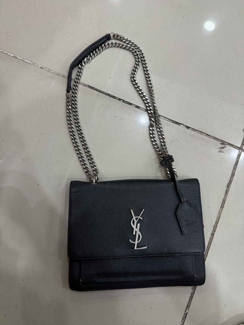 Saint Laurent College Monogram Chain Bag Black (Category: Luxury Bags & Wallets) located in Bacolod City. Submitted by kitcarsonduff (Listing ID 1466487158, Image 1). Description: - Brand: Saint Laurent (YSL) - Style: College Monogram Shoulder Bag - Material: Black grained leather - Hardware: Silver-toned with signature YSL interlocking logo - Features: Chain strap with leather shoulder guard, rear exterior slip pocket, and secure magnetic closur