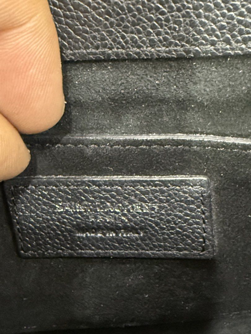 Saint Laurent College Monogram Chain Bag Black (Category: Luxury Bags & Wallets) located in Bacolod City. Submitted by kitcarsonduff (Listing ID 1466487158, Image 3). Description: - Brand: Saint Laurent (YSL) - Style: College Monogram Shoulder Bag - Material: Black grained leather - Hardware: Silver-toned with signature YSL interlocking logo - Features: Chain strap with leather shoulder guard, rear exterior slip pocket, and secure magnetic closur