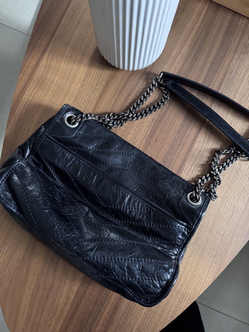 Saint Laurent Niki Chain Bag Black (Category: Luxury Bags & Wallets) located in San Pedro. Submitted by jasdecluttersph (Listing ID 1466563430, Image 3). Description: 🖤 PRELOVED YSL NIKI-STYLE BAG | 28CM | BLACK Decluttering this beautiful YSL Niki-style shoulder bag in classic black. 🤍 ✨ Quilted leather-look finish ✨ Iconic YSL-style monogram hardware ✨ Silver-tone chain strap with leather shoulder section ✨ Approx. 28cm width ✨ Spacious and e