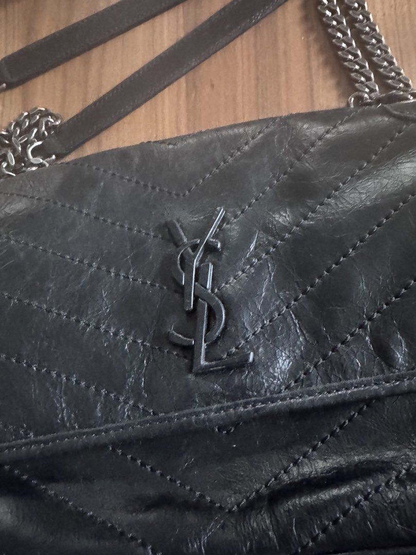 Saint Laurent Niki Chain Bag Black (Category: Luxury Bags & Wallets) located in San Pedro. Submitted by jasdecluttersph (Listing ID 1466563430, Image 2). Description: 🖤 PRELOVED YSL NIKI-STYLE BAG | 28CM | BLACK Decluttering this beautiful YSL Niki-style shoulder bag in classic black. 🤍 ✨ Quilted leather-look finish ✨ Iconic YSL-style monogram hardware ✨ Silver-tone chain strap with leather shoulder section ✨ Approx. 28cm width ✨ Spacious and e