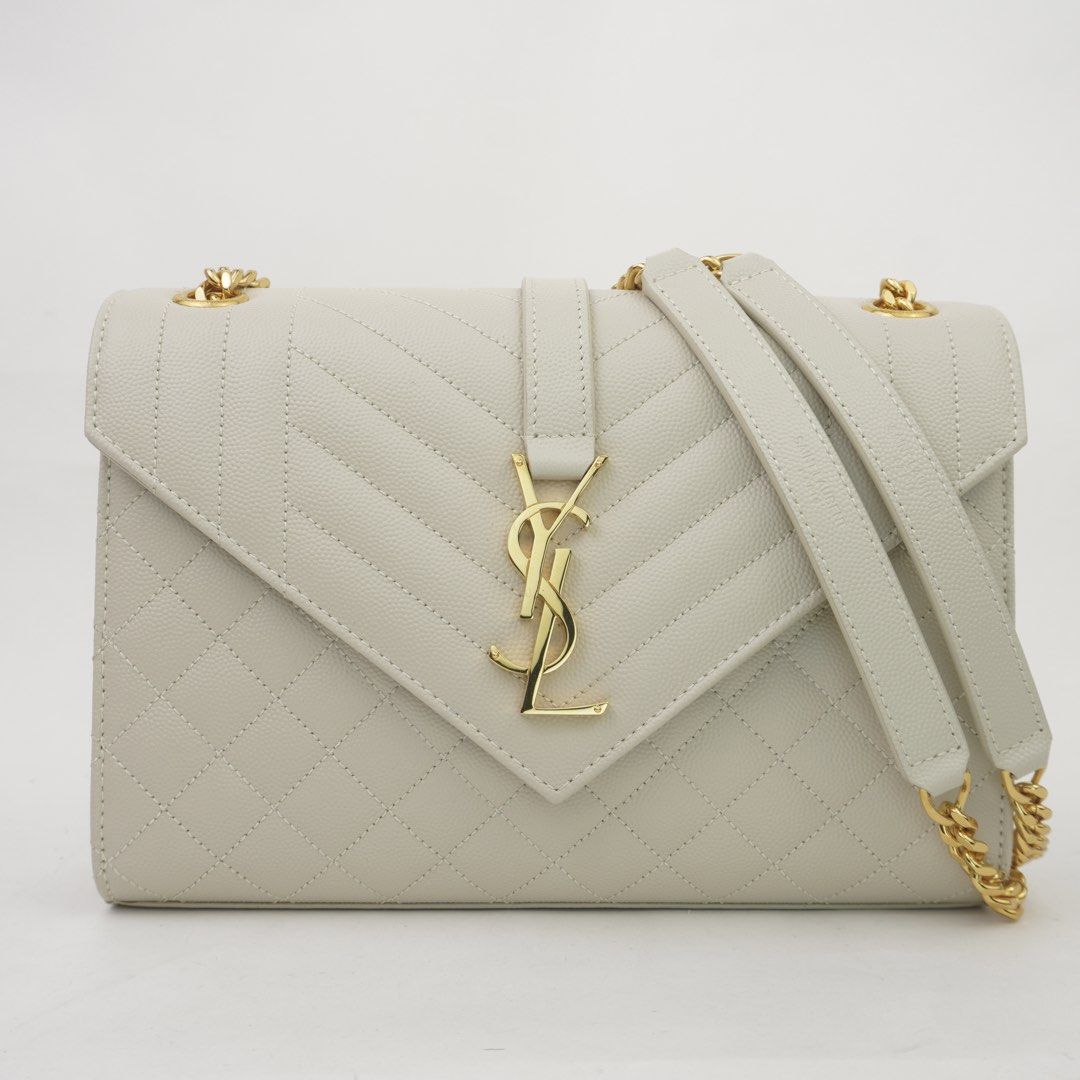 Saint Laurent White Quilted Grain De Poudre Embossed Envelope (Category: Luxury Bags & Wallets) located in Taguig. Submitted by dluxenest (Listing ID 1466355286, Image 1). Description: Last price posted Inclusion: dust bag You may follow us on IG : dluxenest FB : Dragons Luxe Nest.