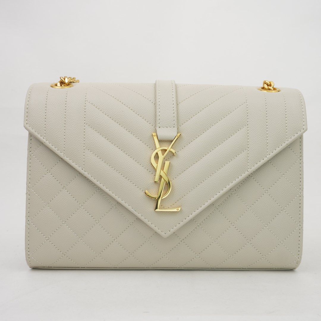 Saint Laurent White Quilted Grain De Poudre Embossed Envelope (Category: Luxury Bags & Wallets) located in Taguig. Submitted by dluxenest (Listing ID 1466355286, Image 2). Description: Last price posted Inclusion: dust bag You may follow us on IG : dluxenest FB : Dragons Luxe Nest.