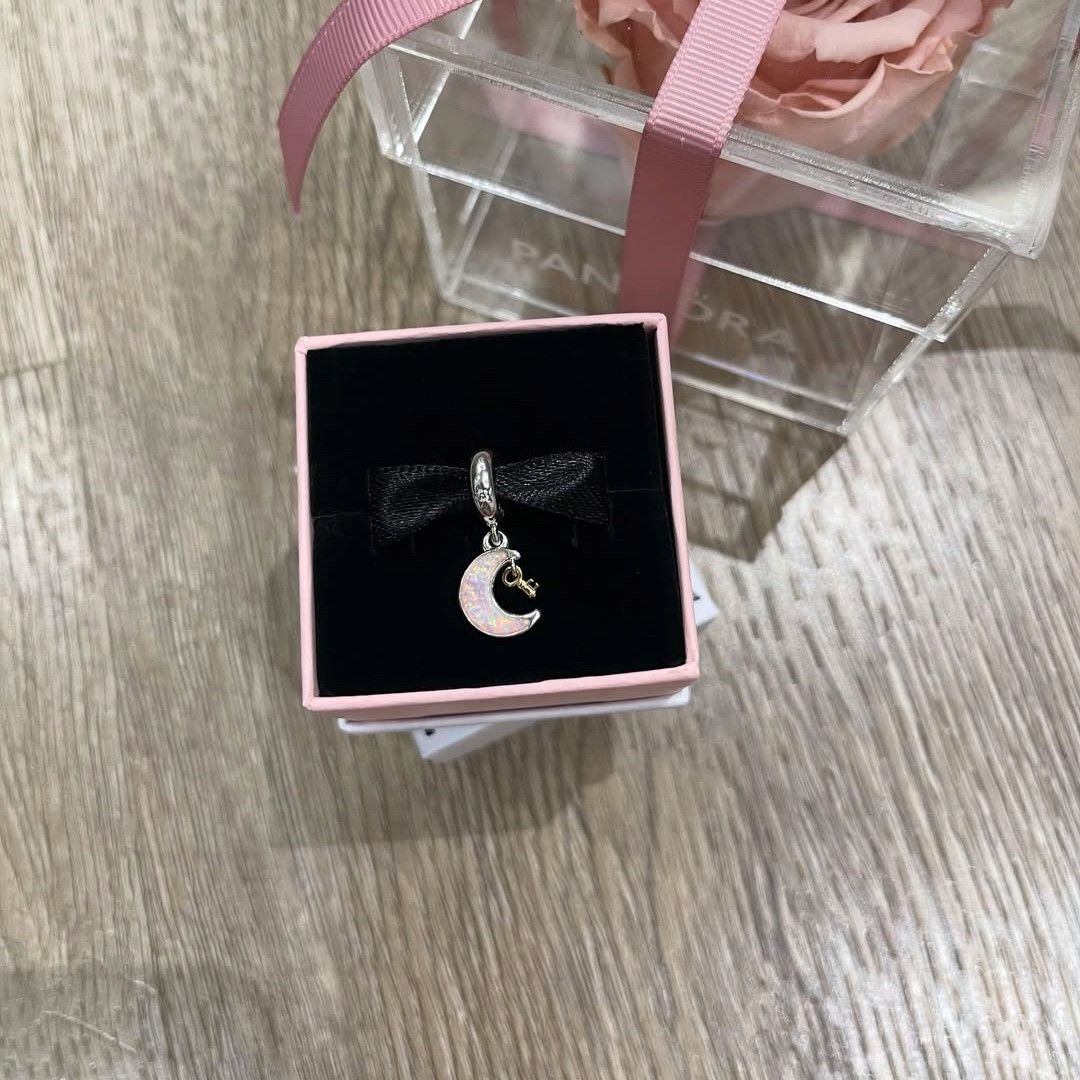 SALE❗Pandora Two-tone Key & Moon Dangle Charm (Category: Charms) located in Manila. Submitted by badaloves_u (Listing ID 1466425215, Image 1). Description: - 💯 Authentic Pandora with Authenticity ALE marks - FREE Box and Paper bag 🛍️ - ✨ FREE Cleaning to any Pandora Store 🛵 LALAMOVE courier for same day delivery 🚚 J&T provincial courier.