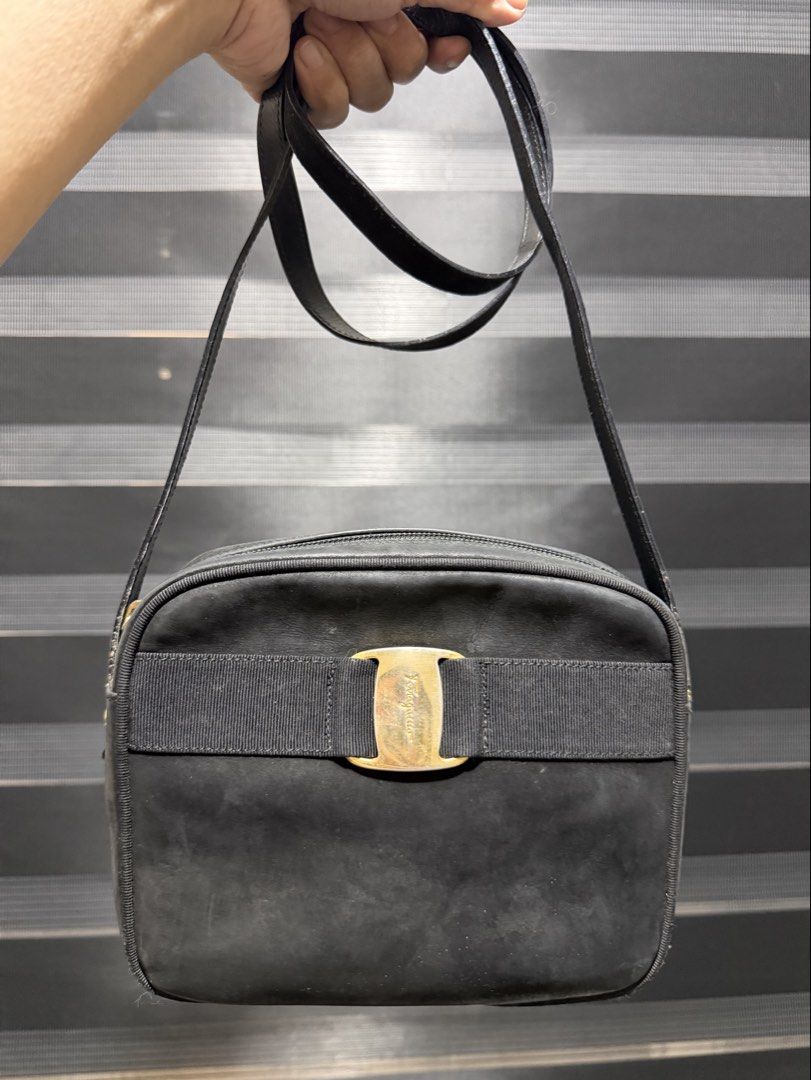 Salvatore Ferragamo (Category: Luxury Bags & Wallets) located in Tarlac. Submitted by rizasdeclutteringonline2 (Listing ID 1466518723, Image 1). Description: Salvatore Ferragamo Gamuza - may pagka gamuza po yun labas nya kaya parang namumuti po. - faded na ng konti hardware pero still gold pa din - may mga marking na white dahil gamuza labas(dahil din sa lightings) - Not Free SF po - no cracks - no holes or butas - still negotiable wag lang po ma
