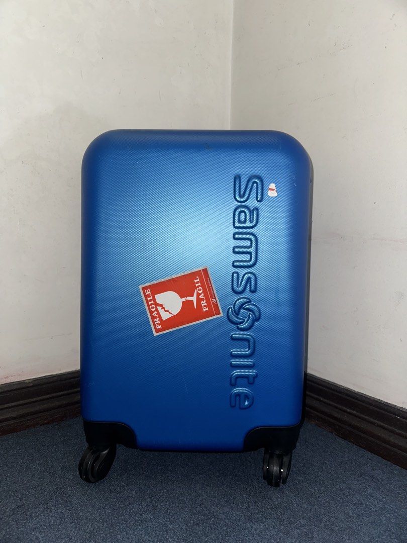 Samsonite Blue Hard Shell Luggage Suitcase (Category: Luggage) located in Marikina City. Submitted by ahhhmayzing (Listing ID 1466412736, Image 1). Description: Newly replaced wheels. Everything working. Only issue: the handle needs wd-40, it has sumpong sometimes..