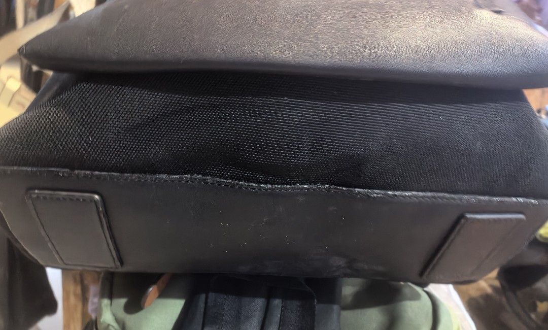 Samsonite Red Black Leather Backpack Laptop Bag (Category: Backpacks) located in Cagayan de Oro. Submitted by tommygurl1218 (Listing ID 1466437120, Image 2). Description: - Authentic Samsonite Red black backpack - Premium leather and durable fabric construction - Flap top closure with a secure metal clasp - Padded interior laptop compartment with securing strap - Extra zipper pockets for easy organization - Comfortable top carry handle and adjust