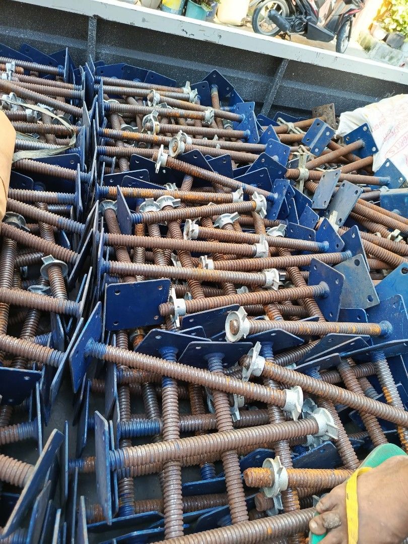 Scaffolding Screw Jacks Base Plates (Category: Construction Tools & Equipment) located in Manila. Submitted by clarisse_romero (Listing ID 1466471889, Image 2). Description: - Item: Heavy-duty scaffolding screw jacks (multiple pieces available) - Condition: Job-site used with surface rust on threads, still structurally solid - Features: Blue painted base plates, sturdy threaded steel rods, and smooth adjusting nuts - Ideal For: Construction proje