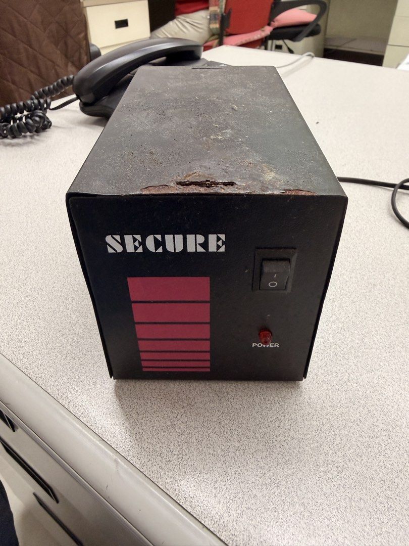 Secure Voltage Regulator UPS Computer Use Only (Category: Electrical, Adaptors & Sockets) located in Manila. Submitted by officialrodz (Listing ID 1466386227, Image 1). Description: - Secure power unit designed specifically for computer setups - Stylish black metal casing with striking red graphic stripes, power switch, and indicator light - Equipped with 3 grounded electrical outlets and a 5A fuse cap on the back - Condition note: Stored in a du